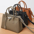 Everyday Essentials กระเป๋าถือหนัง PU